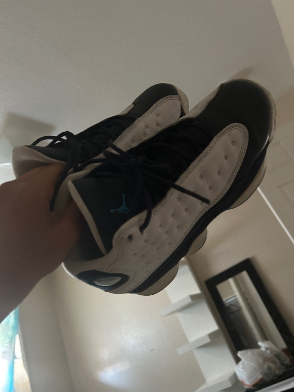 Blue and white Jordan 13’s